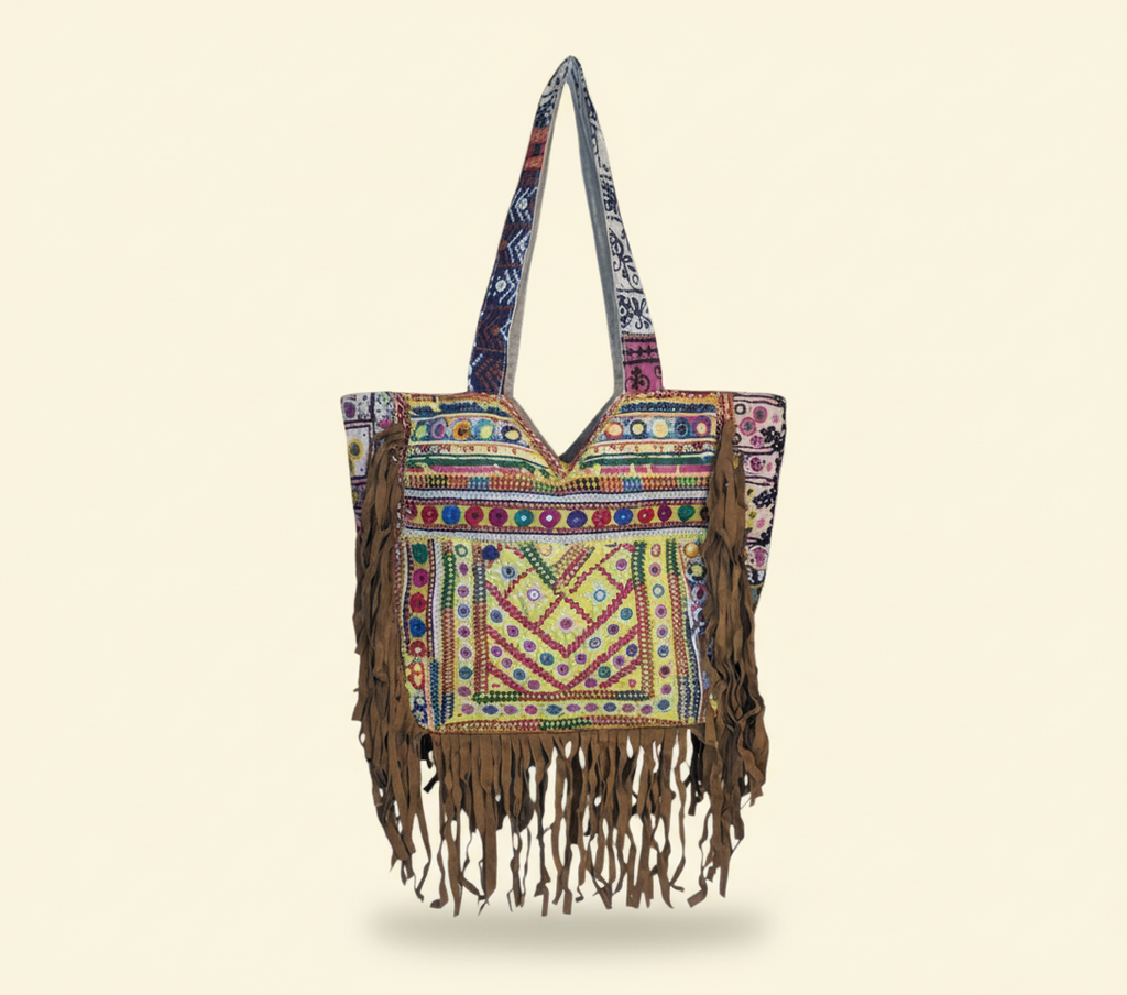 Model carrying Shell Tassel Amber Fringe tote bag — boho style