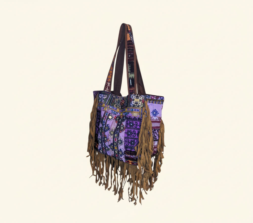 Model carrying Shell Tassel Emerald Fringe tote bag — boho style