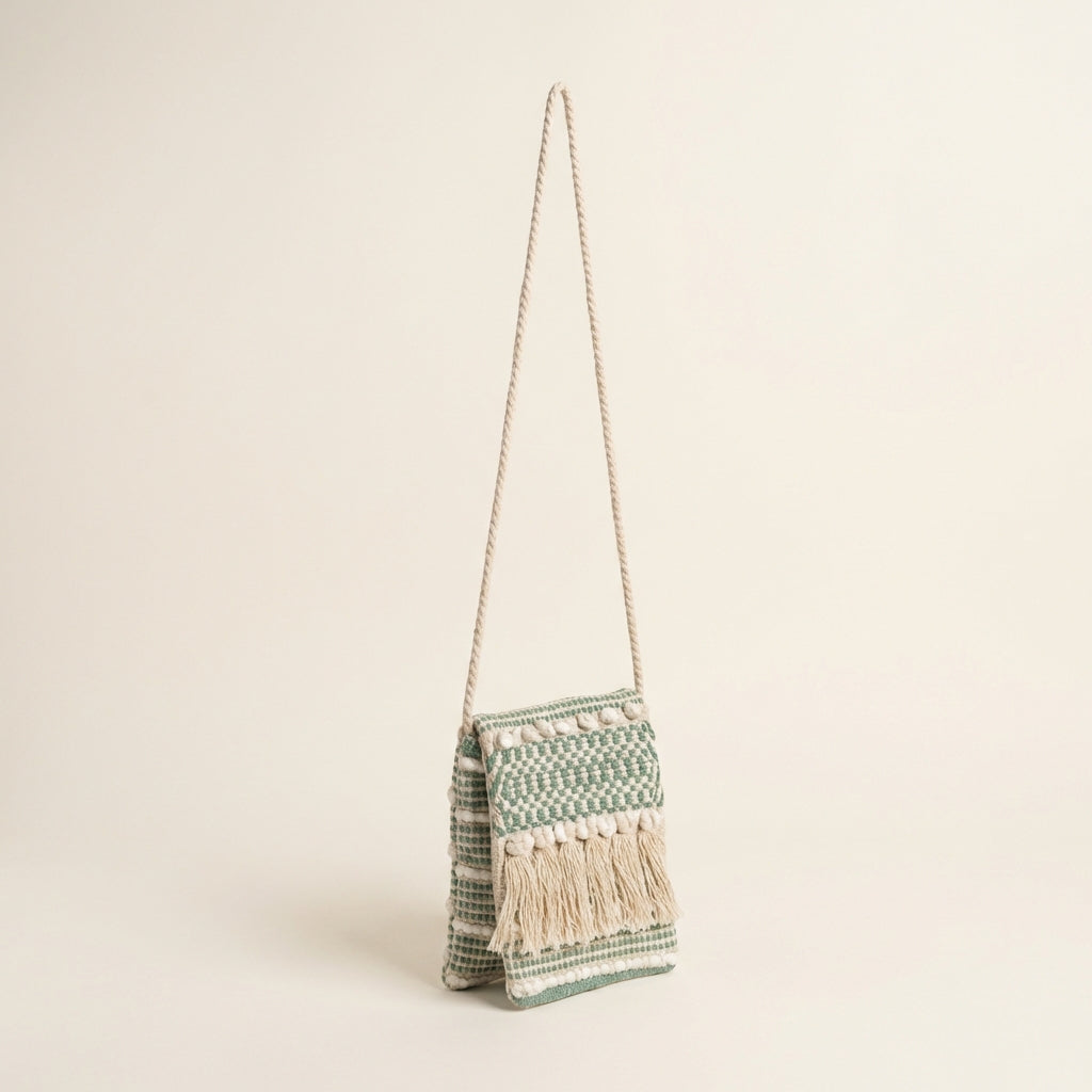Woven Earth Sage Lattice sling bag side view showing strap