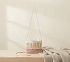 Woven Earth Blush Lattice sling bag side view showing strap